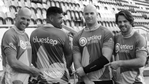 An image showing the Saints rugby team wearing the Cycle4Cynthia jerseys produced by Bluestep Solutions