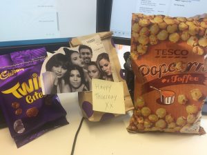 An image showing snacks and a picture of the kardashians