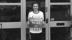 Becca holding 110 miles to go sign